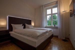 Postel nebo postele na pokoji v ubytování Residenz Itterbach