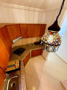 Η κουζίνα ή μικρή κουζίνα στο Tiziri apartments +15 φωτογραφίες