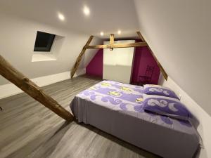 Postel nebo postele na pokoji v ubytování La Maison de Lili - 3 Chambres