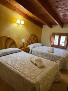 Postel nebo postele na pokoji v ubytování Retiro Gastro-Rural - Casa 2