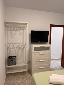 TV a/nebo společenská místnost v ubytování El Cecilio