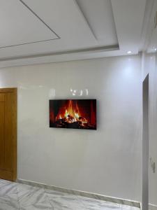 TV a/nebo společenská místnost v ubytování Downtown Fez Retreat + 4 fotografie