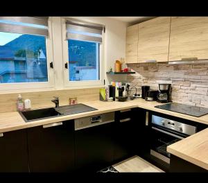 Kuchyň nebo kuchyňský kout v ubytování Morzine Ressachaux A3 - Chrismas Apt