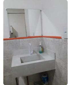 Et badeværelse på Residencial Crispim + 4 billeder