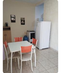 Køkken eller tekøkken på Residencial Crispim