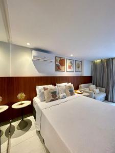 Ένα ή περισσότερα κρεβάτια σε δωμάτιο στο Unity - Cabo Branco by Jess