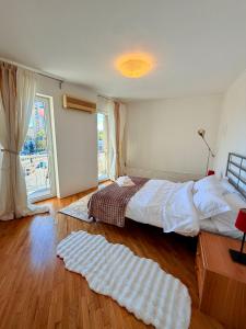 Postel nebo postele na pokoji v ubytování Beating heart appartement