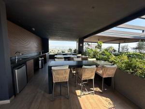 Balkón nebo terasa v ubytování Moderno departamento con vista a Santa Lucía, Mty