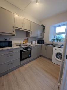 Kuchyň nebo kuchyňský kout v ubytování Modern 1-Bed Tandragee Portadown - BT62 2BP
