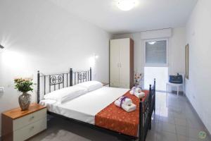 Ένα ή περισσότερα κρεβάτια σε δωμάτιο στο Apartments in Lignano 21760