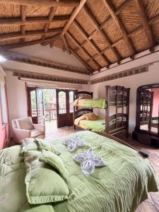 Ένα ή περισσότερα κρεβάτια σε δωμάτιο στο La Casa Colonial