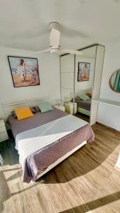 Ένα ή περισσότερα κρεβάτια σε δωμάτιο στο Las Palmeras del Sol