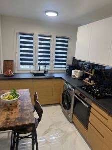 Køkken eller tekøkken på Chambre chez Ayoub