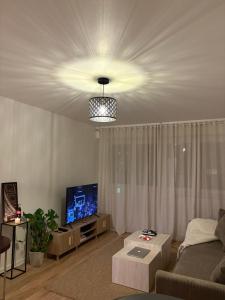 Et tv og/eller underholdning på Chambre chez Ayoub