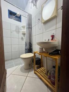 Ένα μπάνιο στο Chalé Moinho Com Localização Excepcional em Carrancas - MG