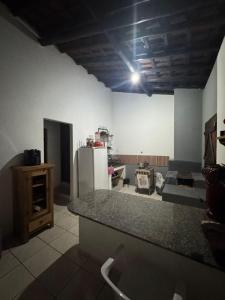 Η κουζίνα ή μικρή κουζίνα στο Chalé Moinho Com Localização Excepcional em Carrancas - MG