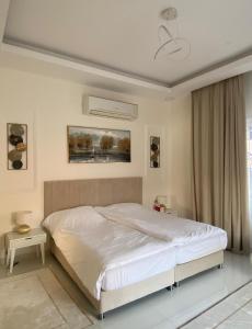 Postel nebo postele na pokoji v ubytování Luxury Ocean View Room