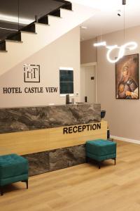 a lobby with a hotel castle view and a reception at Hotel Castle View in Krujë
