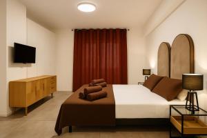 TV a/nebo společenská místnost v ubytování Marisabella Suite Spa 5