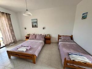 Ένα ή περισσότερα κρεβάτια σε δωμάτιο στο Alia Suites and Spa +3 φωτογραφίες