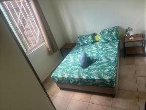 Ένα ή περισσότερα κρεβάτια σε δωμάτιο στο Maeva House