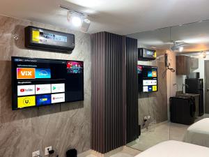 Μια τηλεόραση ή/και κέντρο ψυχαγωγίας στο Seaview Comfort Studio