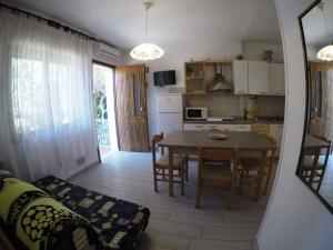 Η κουζίνα ή μικρή κουζίνα στο Apartment in Rosolina Mare 35637