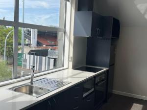 Kuchyň nebo kuchyňský kout v ubytování Hamilton Suites