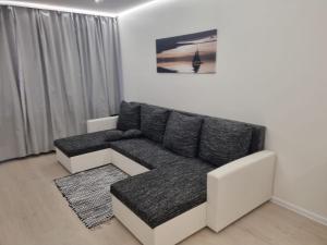 Χώρος καθιστικού στο Pilsētas sirds apartamenti