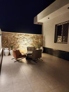 Χώρος καθιστικού στο بيوت عطلات منزال الجبل