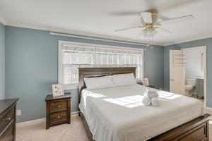 a bedroom with a bed and a ceiling fan at Private Pool and Home Theater Buchanan Family Home! in Buchanan