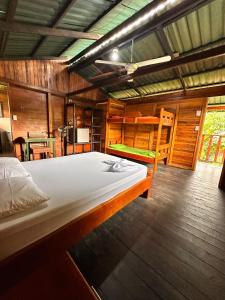 Ένα ή περισσότερα κρεβάτια σε δωμάτιο στο Casa Cachalote