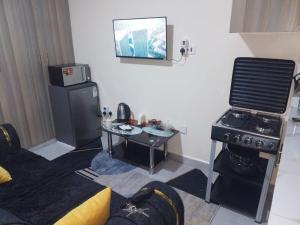 Кухня или мини-кухня в Wanjo Cozy Corner
 +1 фотография