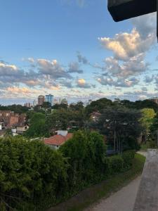 a view of a city with buildings and trees at aba casa estudio in Pinamar +6 photos