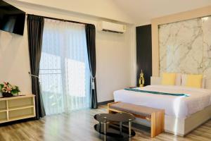 a bedroom with a large white bed and a window at Lebest Pool Villa Chiang Mai in Ban Mai +119 photos