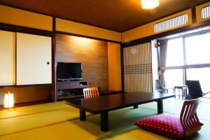 TV a/nebo společenská místnost v ubytování Dantokan Kikunoya + 124 fotografií