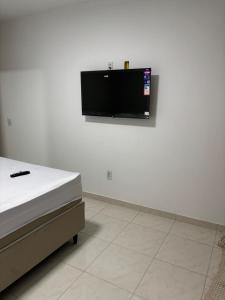 TV a/nebo společenská místnost v ubytování Pousada Flor do Sol