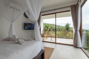 Ένα ή περισσότερα κρεβάτια σε δωμάτιο στο Grand Abinawahill