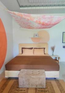 Voodi või voodid majutusasutuse Sarah's Cottage Toba Samosir toas