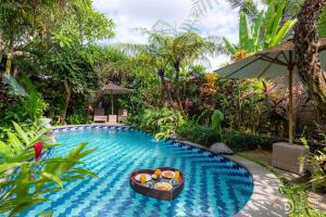 Πισίνα στο ή κοντά στο Gopala Villa Ubud
