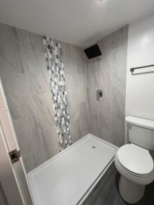 Koupelna v ubytování The Carlyle House with housemate + 14 fotografií