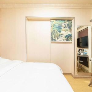 Μια τηλεόραση ή/και κέντρο ψυχαγωγίας στο Shanghai Yujia Hotel +7 φωτογραφίες