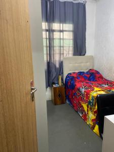 Postel nebo postele na pokoji v ubytování Alugo casa em Santo Antônio de Lisboa para temporada