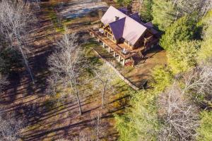 an overhead view of a cabin in a forest at Hot Tub - Mill Creek Point - Red River Gorge KY in Rogers