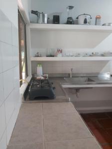 Nhà bếp/bếp nhỏ tại Cabaña Espolon +18 ảnh