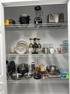 a kitchen filled with lots of pots and pans at Serene Sunshine State Escape in Deltona +3 photos