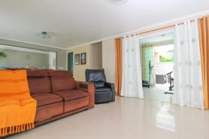 Posezení v ubytování The Oasis Spot - Mansão clube particular