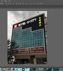 Una vista de un edificio con un cartel en él. en Gcity hotel, en Teluk Intan