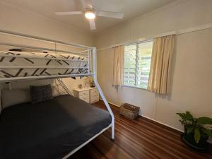 Ένα ή περισσότερα κρεβάτια σε δωμάτιο στο Beach Shack On Barlow