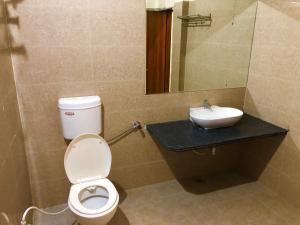 Et badeværelse på Hotel Green valley resort